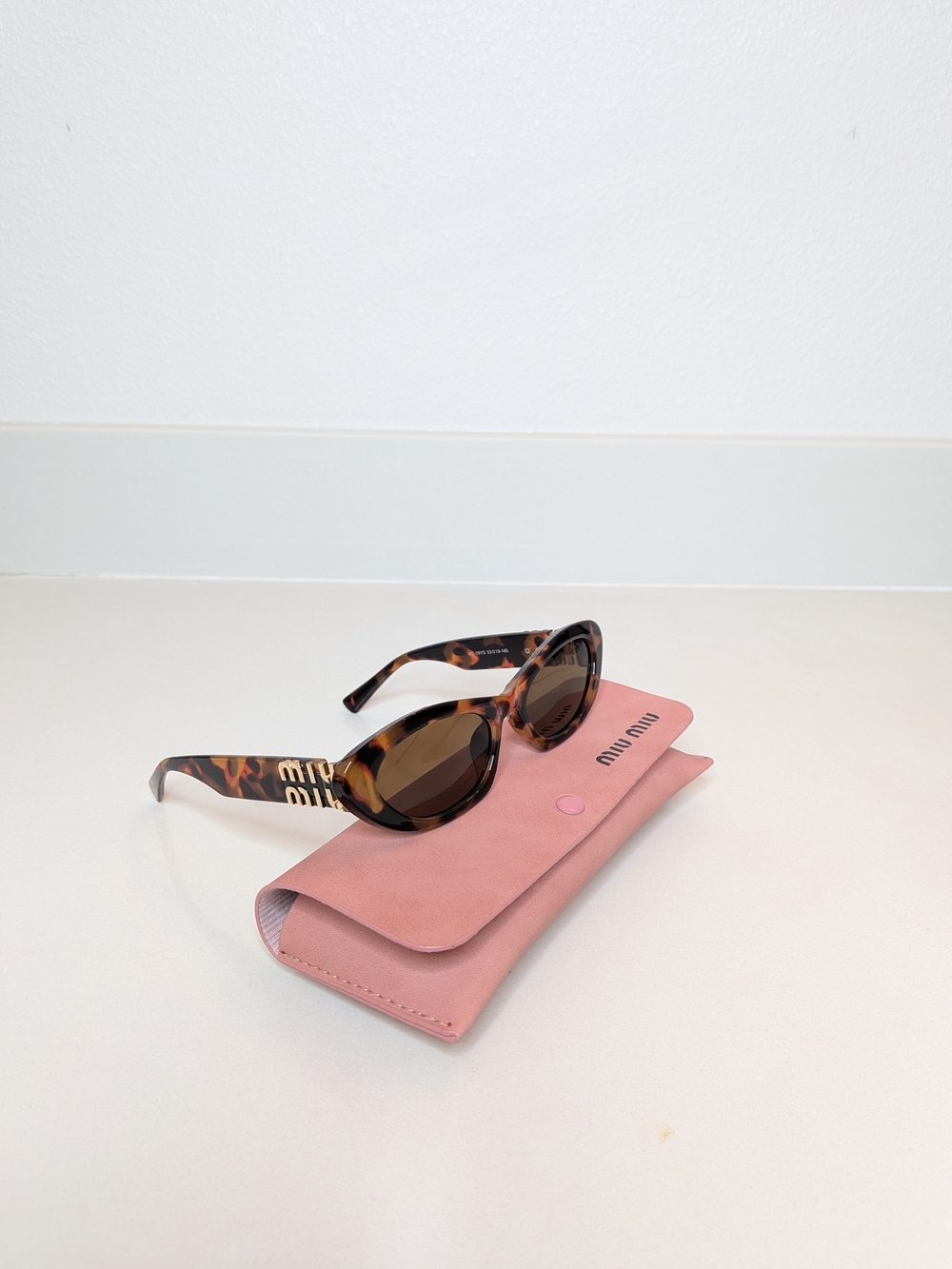 Miu Miu Tortoise Oval Cat Eye Sunglasses Gold Logo